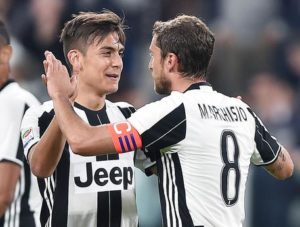 Juventus's Claudio Marchisio jubilates with his teammate Paulo Dybala after scoring the goal during the Italian SERIE A soccer match between Juventus and Genoa at Juventus Stadium in Turin, Italy, 23 April 2017. ANSA/ALESSANDRO DI MARCO
